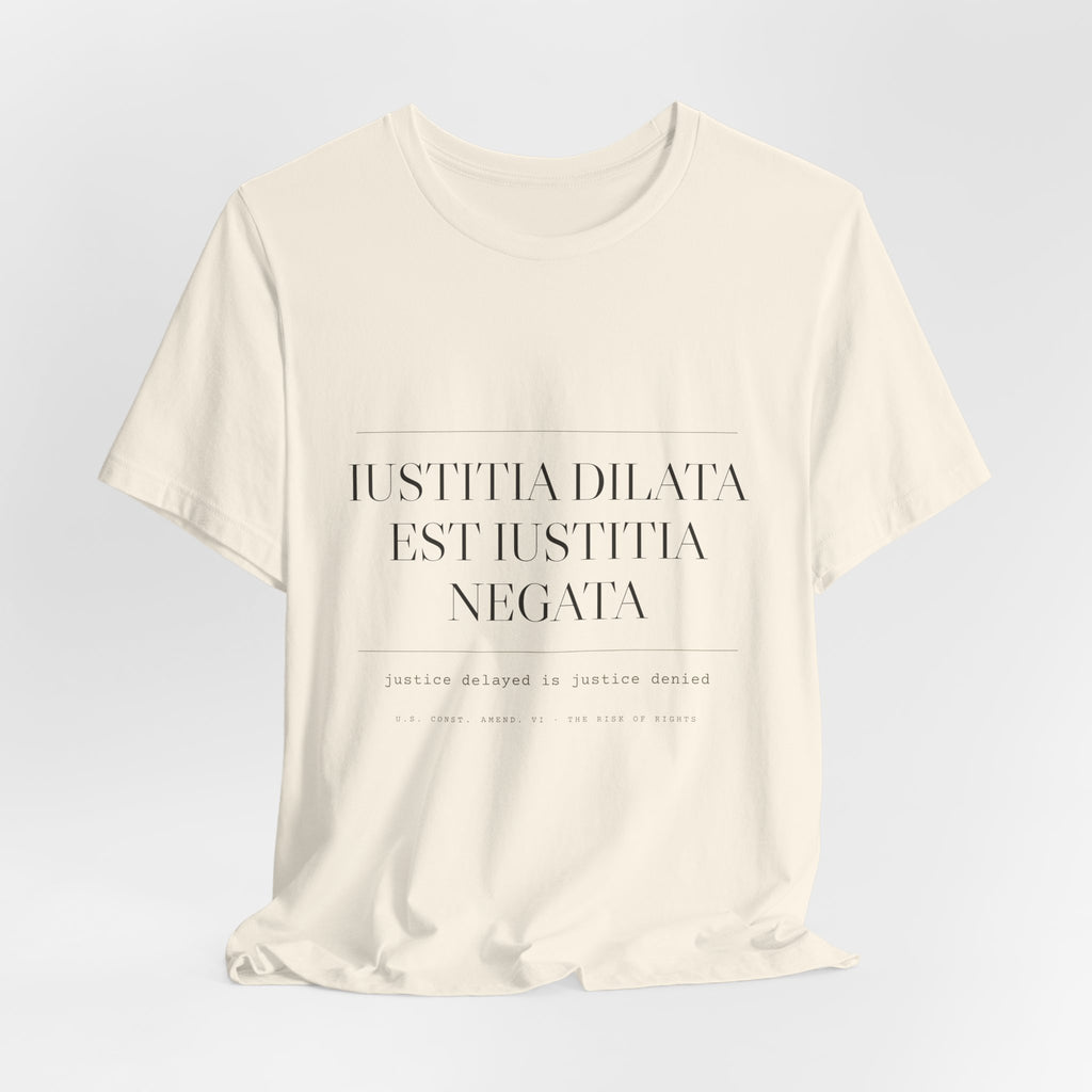 Iustitia Dilata Est Iustitia Negata — Justice Delayed Tee (Natural)