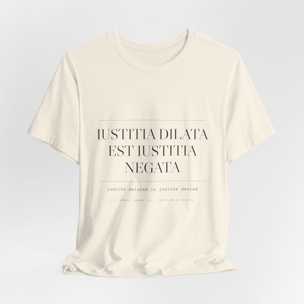 Iustitia Dilata Est Iustitia Negata — Justice Delayed Tee (Natural)