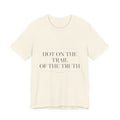 Hot on the Trail of the Truth — Tee (Natural)