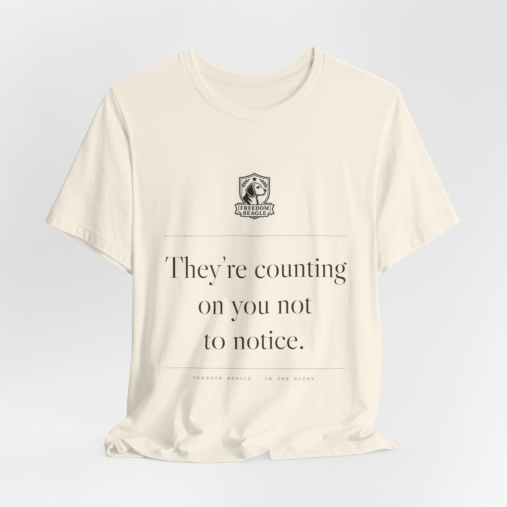 They're Counting On You Not to Notice — Watchdog Tee (Natural)