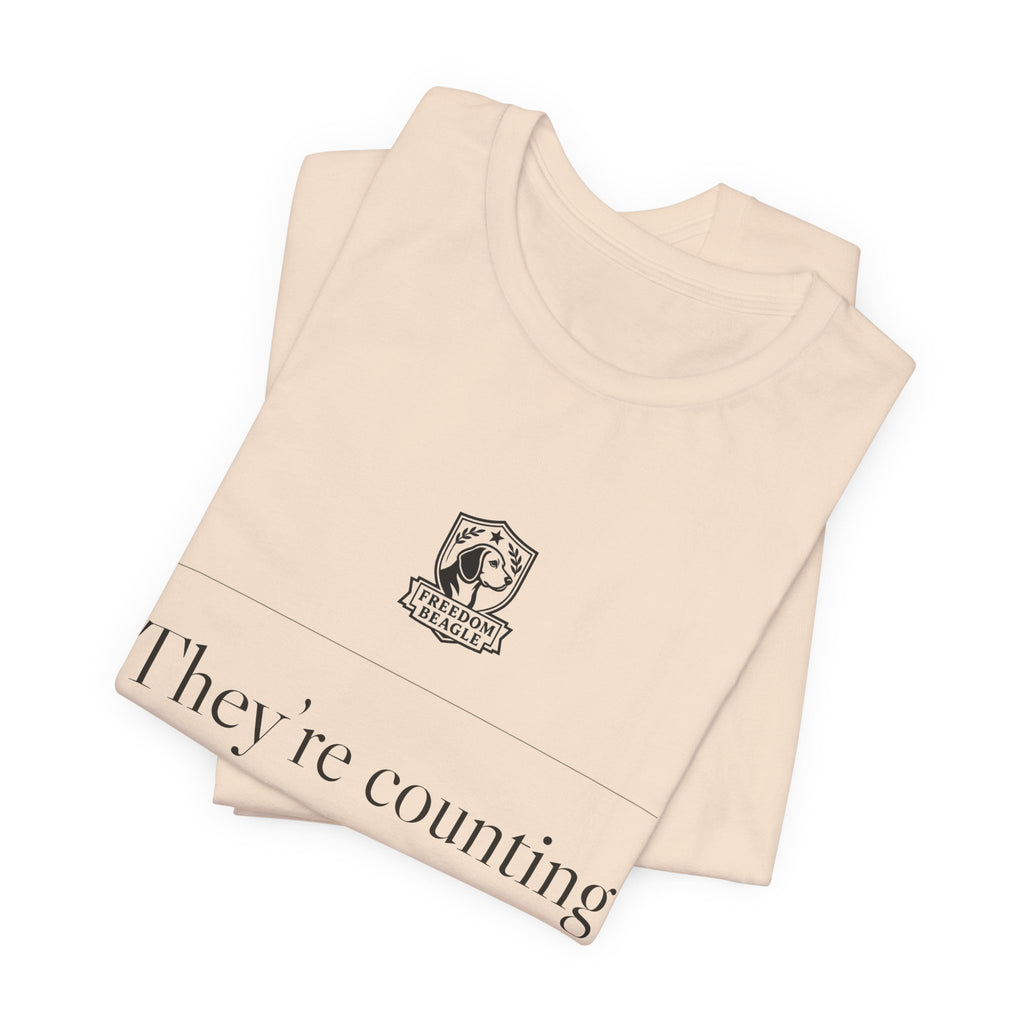 They're Counting On You Not to Notice — Watchdog Tee (Natural)