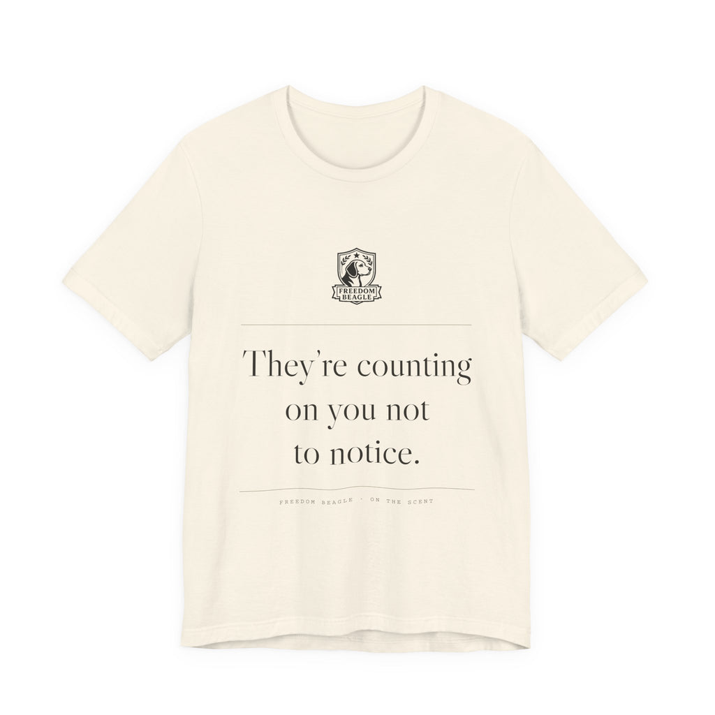 They're Counting On You Not to Notice — Watchdog Tee (Natural)