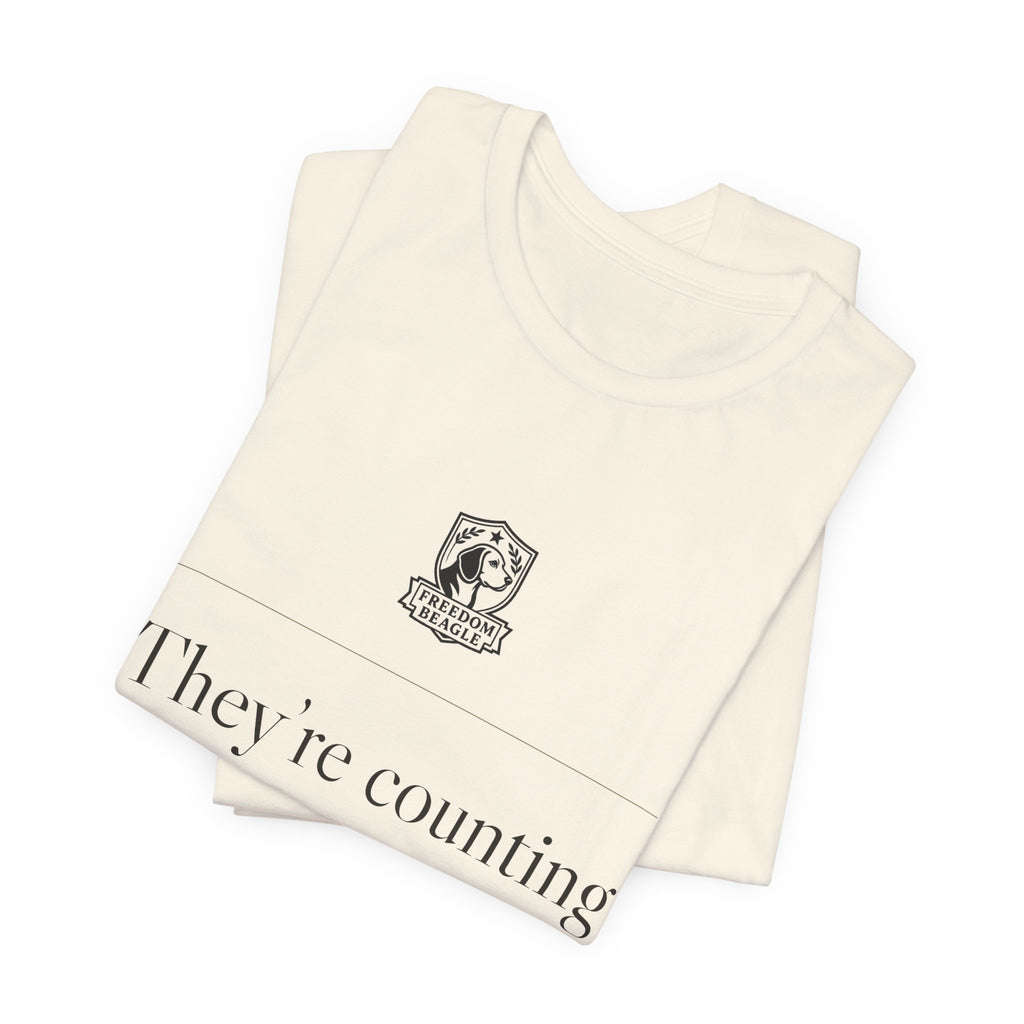 They're Counting On You Not to Notice — Watchdog Tee (Natural)